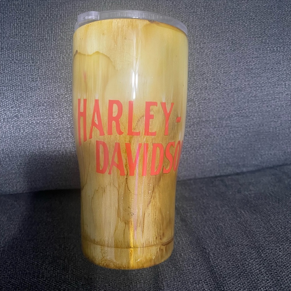 This was made with alcohol, ink resin, and vinyl comes w 16 oz Tumblr a$ cover.